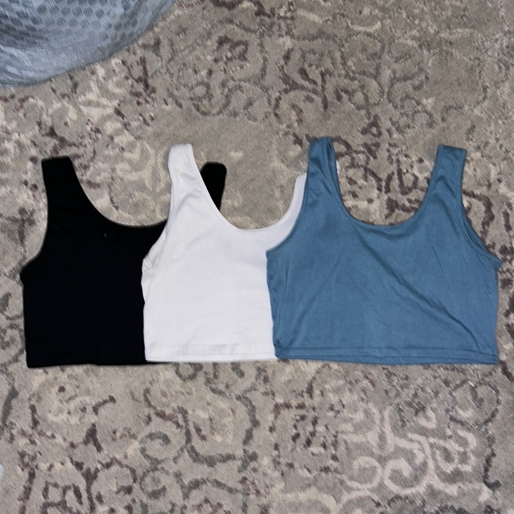blue, black and white cropped tanks !!